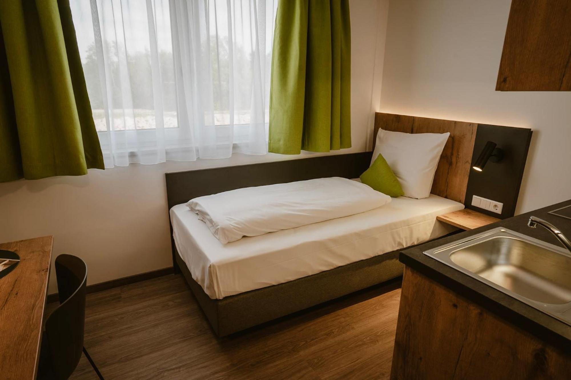 Motel Sleep Inn Toging am Inn Extérieur photo